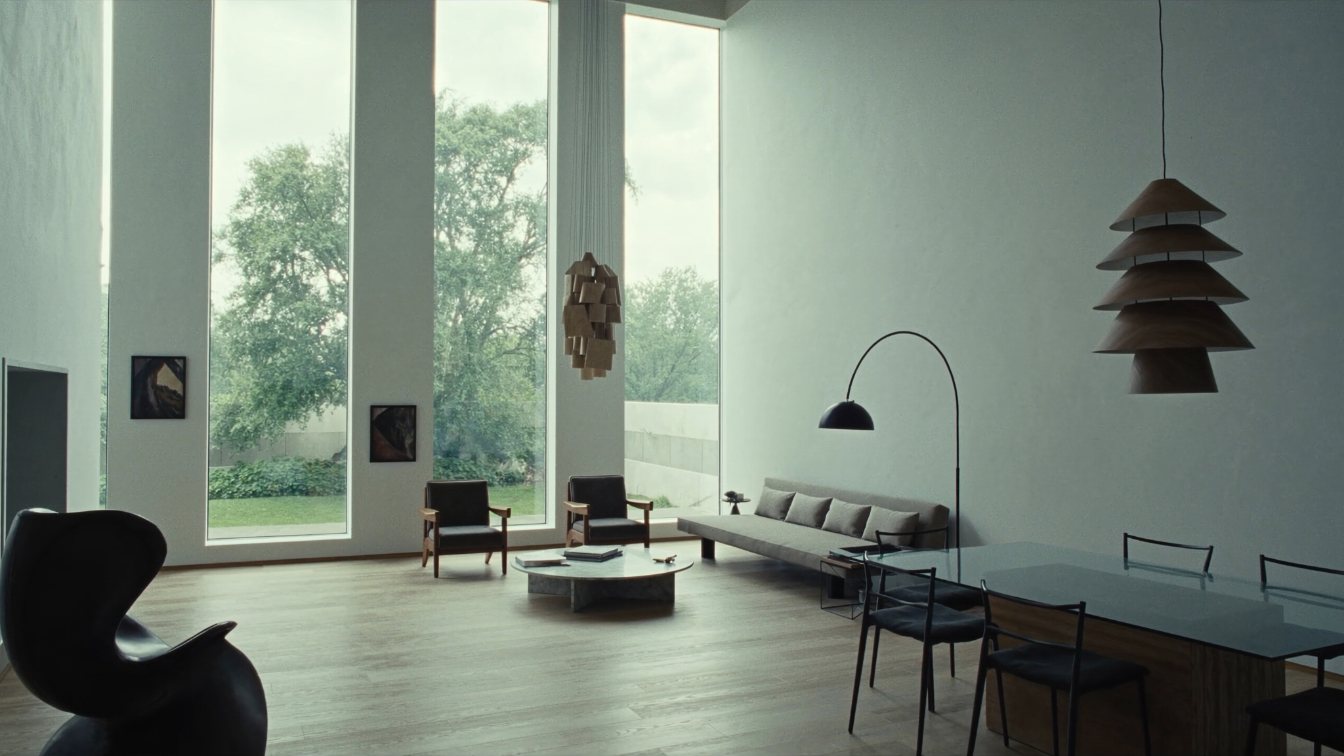 Bright living room with high ceilings and tall windows flooding the space with natural light (illustrative)