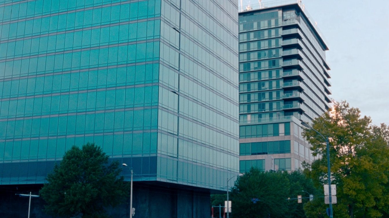 High-rise condominium towers along Yonge Street and Charles Street East in downtown Toronto at dusk (illustrative)