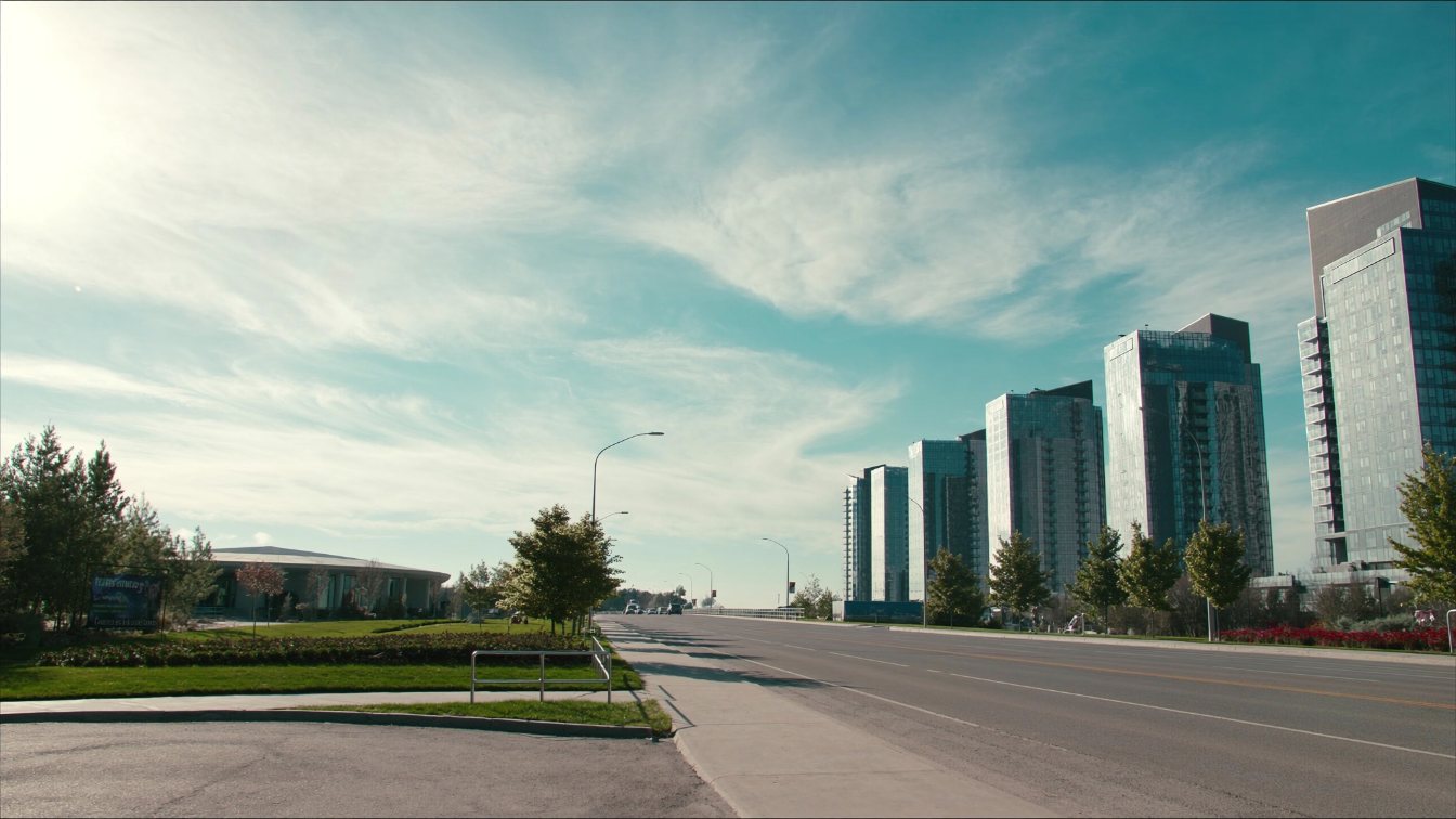 Condominium towers in Markham Centre along Highway 7 on a clear afternoon