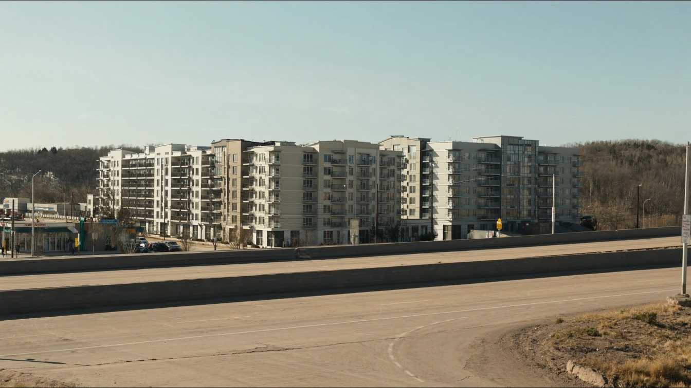 New mid-rise condominium buildings in Milton with the Niagara Escarpment in the distance (illustrative)