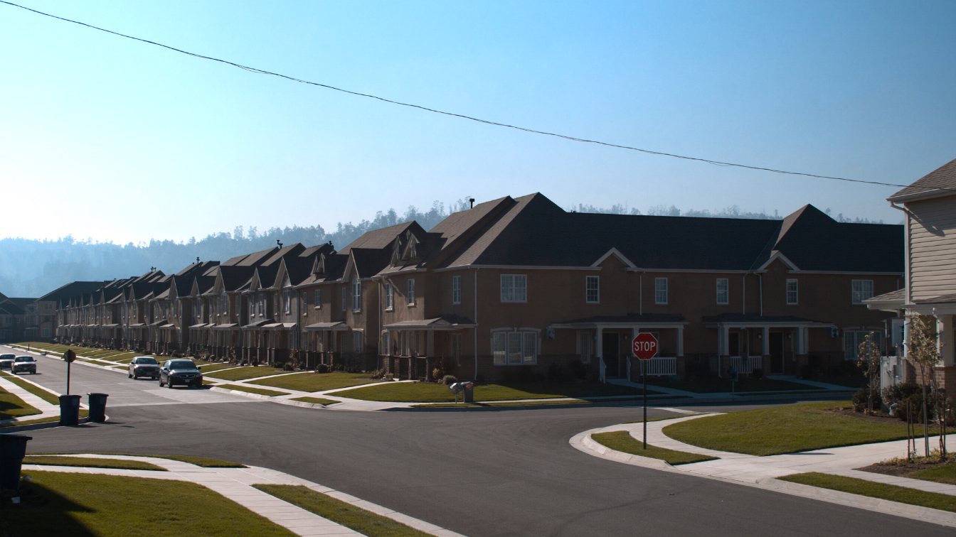 Newer detached and townhouse streets in Milton with the Niagara Escarpment behind (illustrative)
