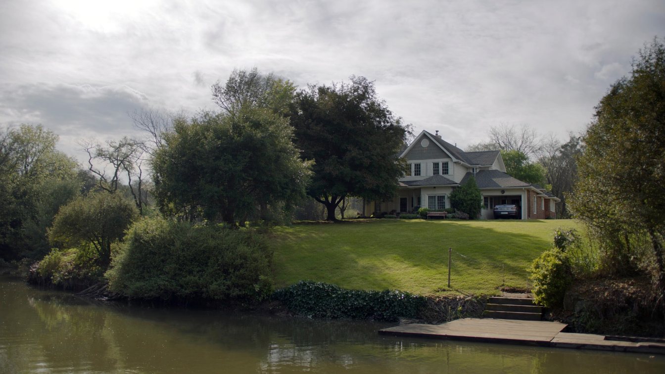 Two Toronto houses on the same street, one on a narrow lot and one on a wide treed lot (illustrative)