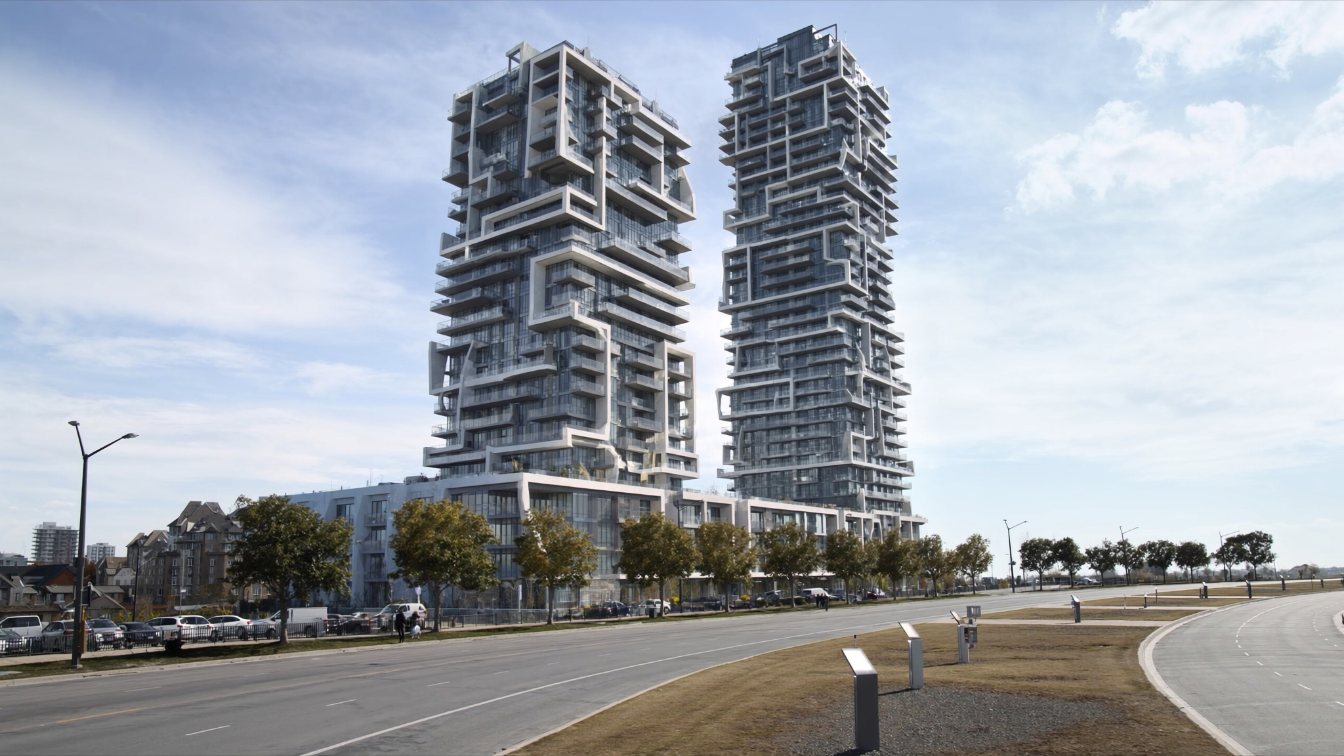 Pair of sculptural concrete and glass residential towers in a new master-planned urban village (illustrative)