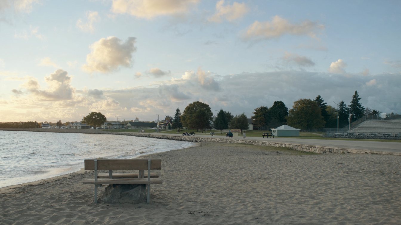 Sandy Lake Ontario beach and harbour in a small town on a calm autumn morning (illustrative)