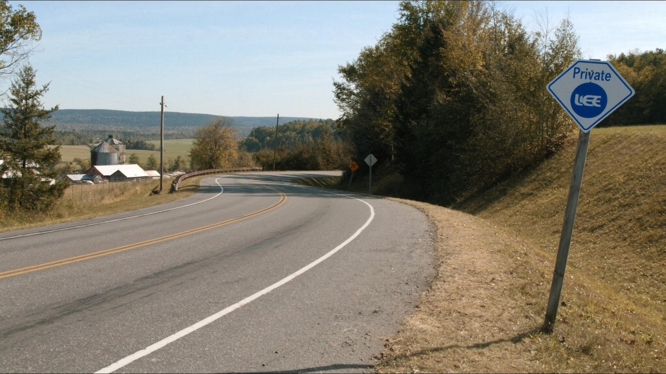 Rural road near the Niagara Escarpment in Halton with autumn colour and farm fields (illustrative)