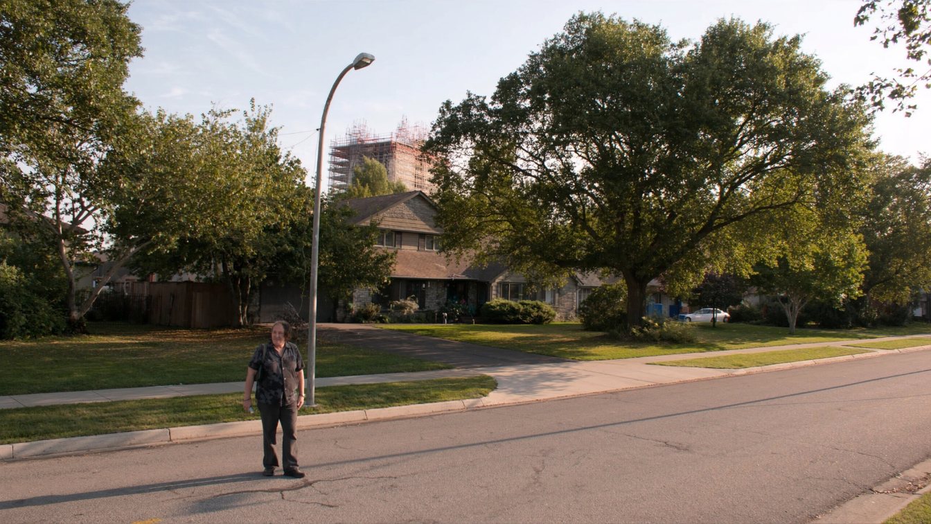 A large residential lot with an older house backing onto a busy arterial road in the GTA (illustrative)