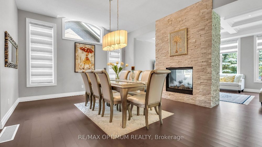 829 Copper Ridge Dr — dining room with see-through fireplace