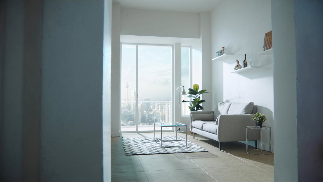 Empty staged condominium living room with a for-sale feel, city view through the window (illustrative)