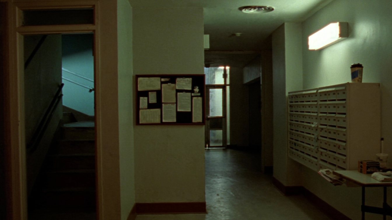 Rental apartment building lobby with mailboxes (illustrative)