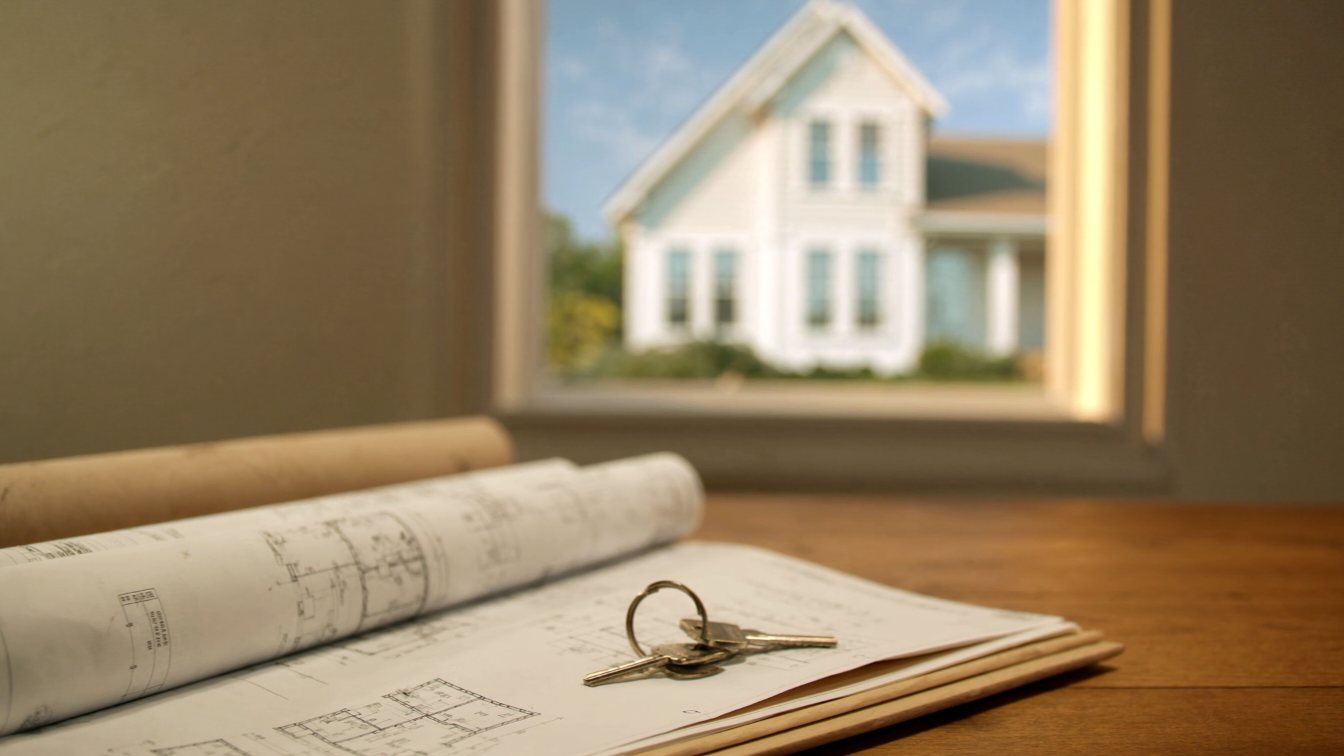 Exchanging a key over floor plans for a pre-construction home (illustrative)