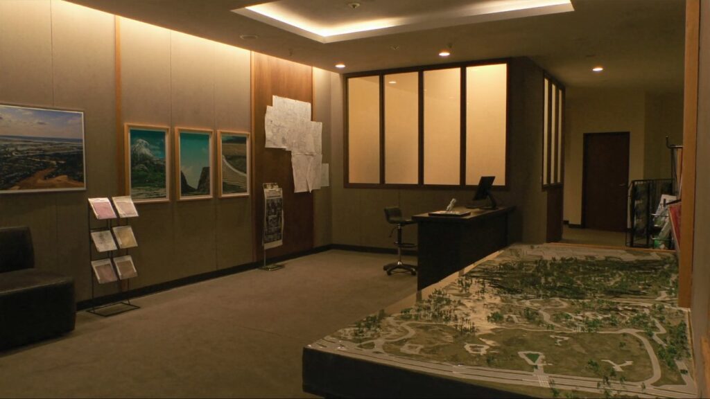 New-home sales centre with a scale model of a subdivision (illustrative)