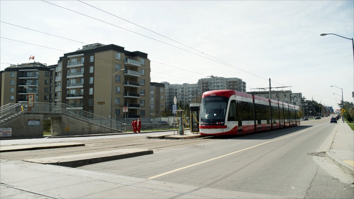 Light rail train at a street stop on Finch Avenue West (illustrative)