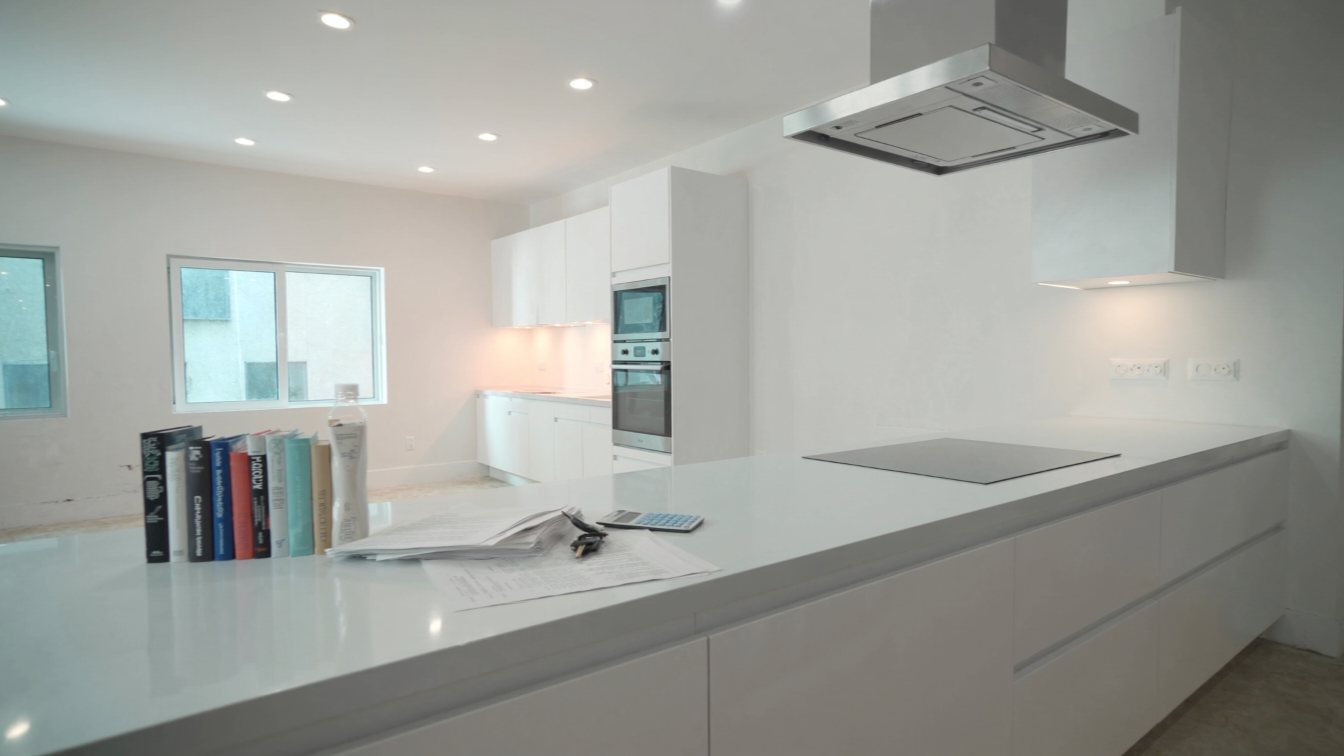 Closing statements, keys and calculator in a newly built home (illustrative)