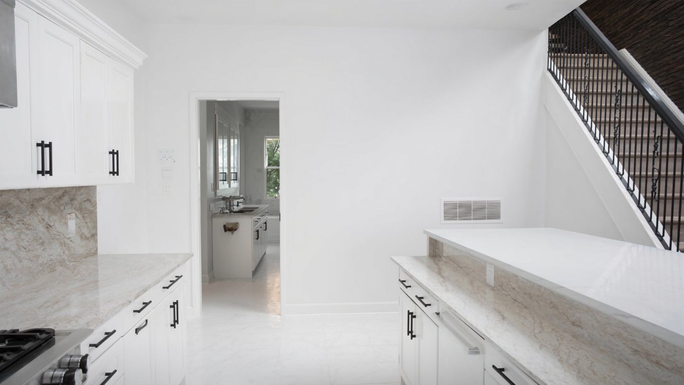 Freshly renovated kitchen staged before a home sale (illustrative)