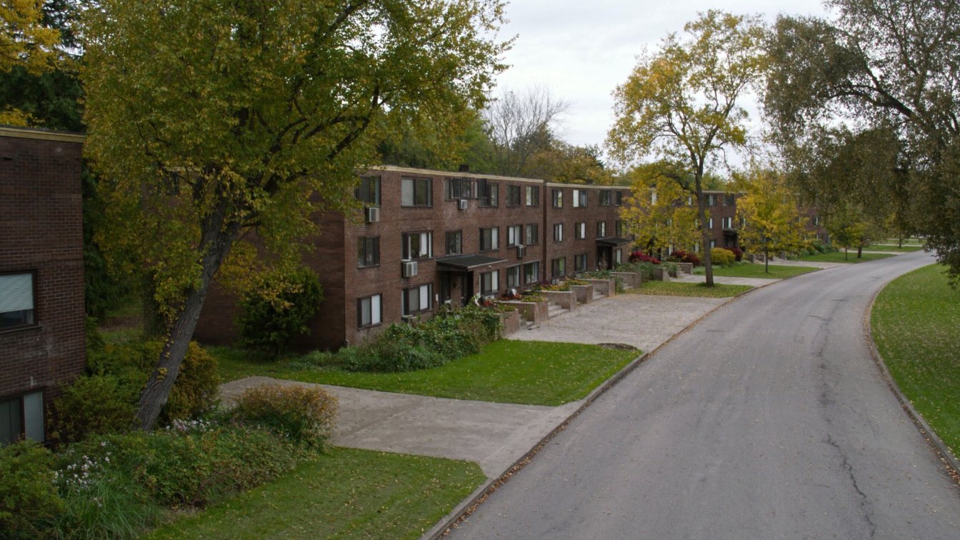 1970s townhouse condominium complex with mature trees in Etobicoke (illustrative)